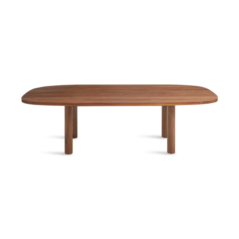The 100 inch Good Times Dining Table from Blu Dot in walnut from a high angle.