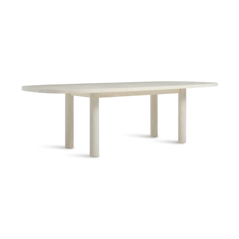 The 100 inch Good Times Dining Table from Blu Dot in whitewashed ash from an angle.