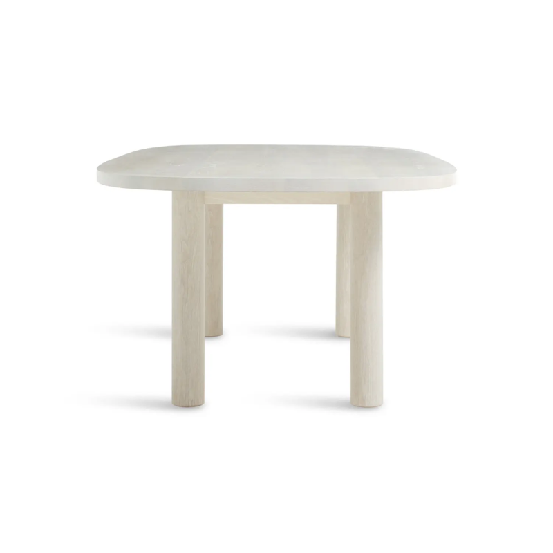 The 100 inch Good Times Dining Table from Blu Dot in whitewashed ash from the side.