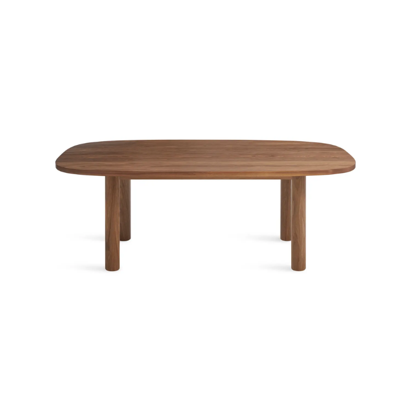 The 82 inch Good Times Dining Table from Blu Dot in walnut from a high angle.