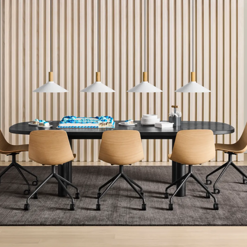 The Good Times Dining Table from Blu Dot in black on ash in a dining room.