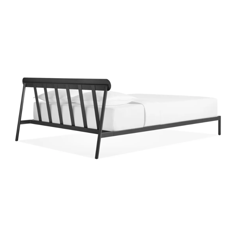 The queen size Goodie Bed from Blu Dot from the back at an angle.