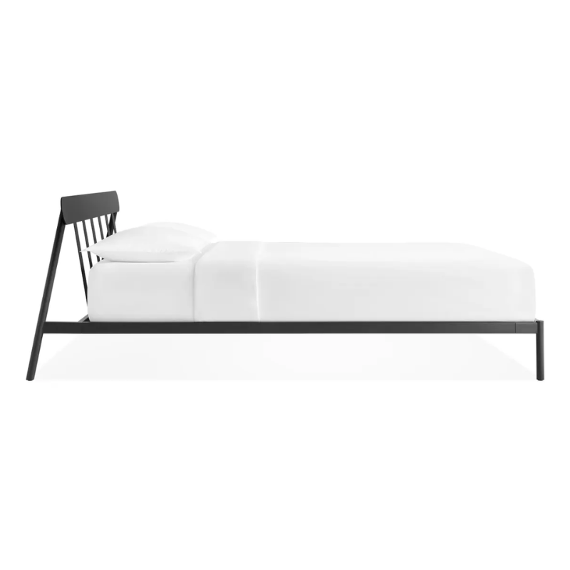 The queen size Goodie Bed from Blu Dot from the side.