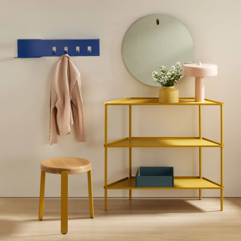 The standard Hang 1 Round Mirror from Blu Dot in a home entryway.