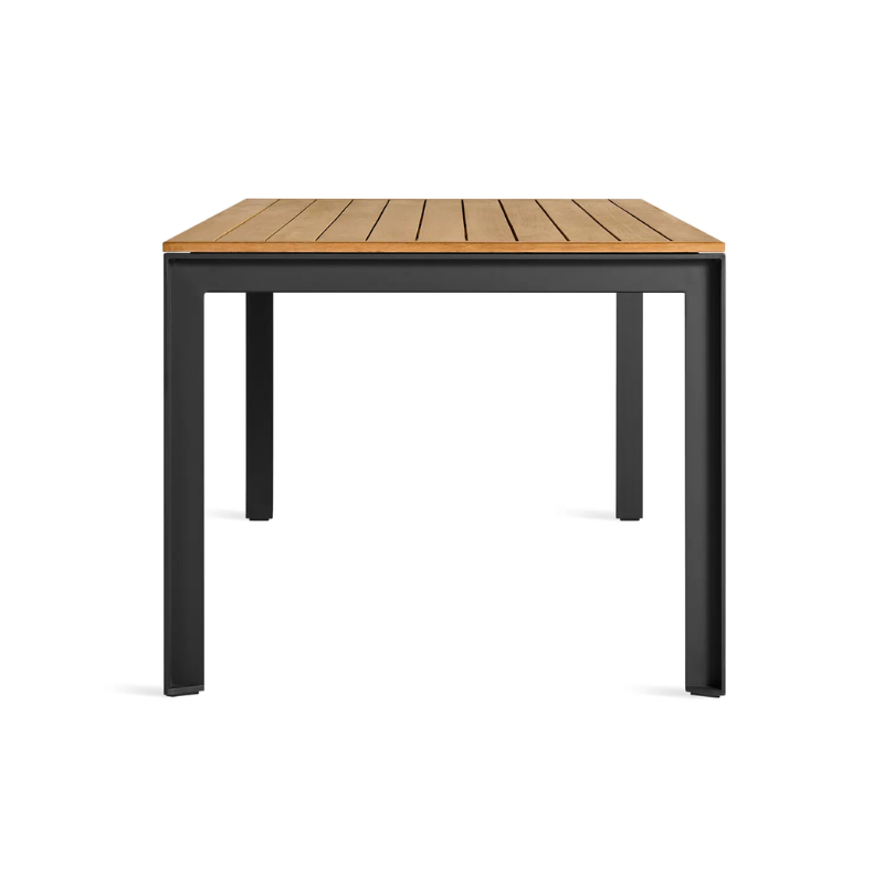 The Hold Tight 76" Outdoor Dining Table from Blu Dot in carbon and teak from the side.