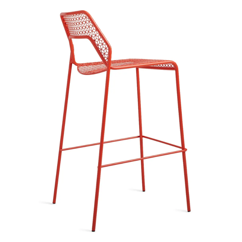 The Hot Mesh Bar Stool from Blu Dot in humble red from an angle.