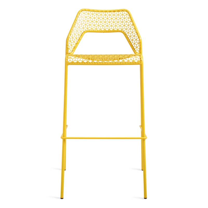 The Hot Mesh Bar Stool from Blu Dot in natural yellow.