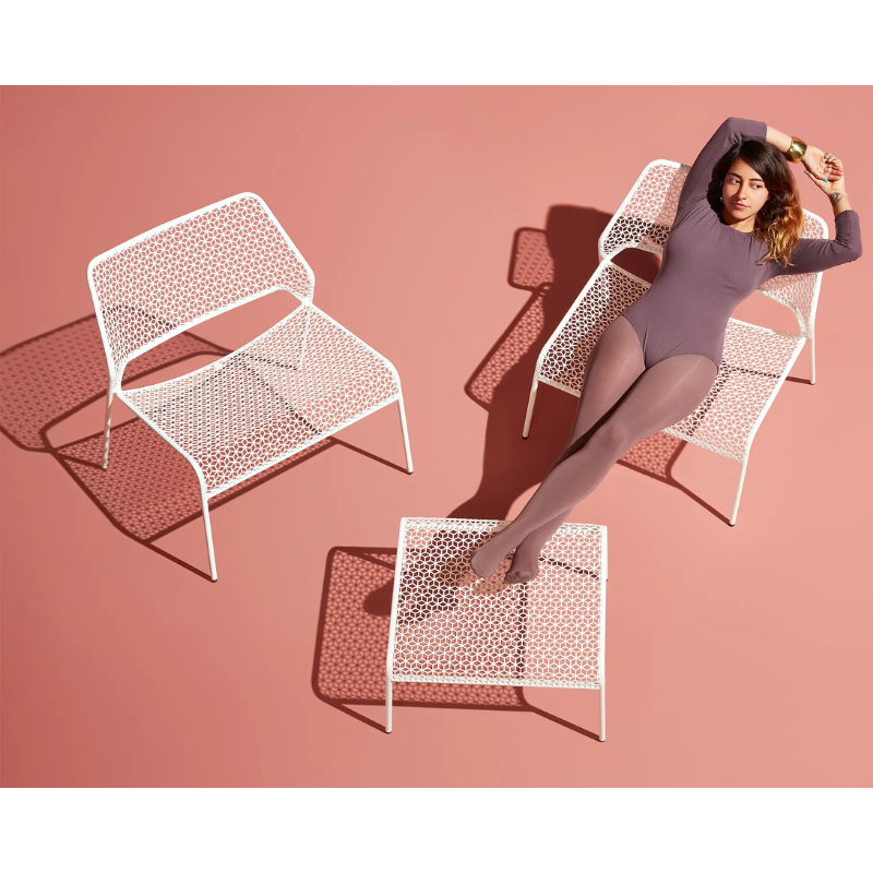 The Hot Mesh Lounge Chair from Blu Dot in a lifestyle.