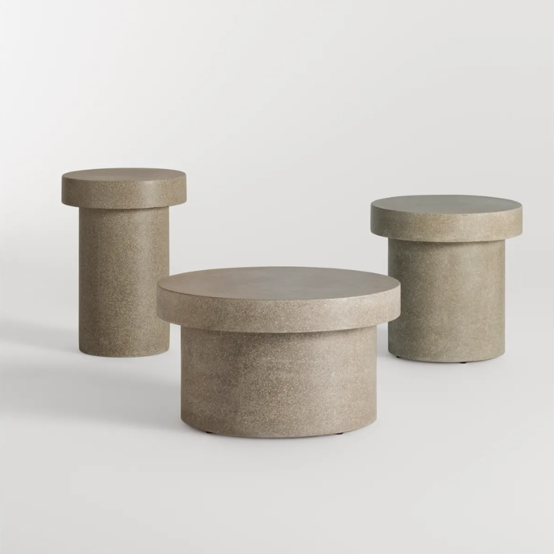 The Hunky Dory Coffee Table from Blu Dot in mushroom terrazzo with the Hunky Dory side tables in a studio.