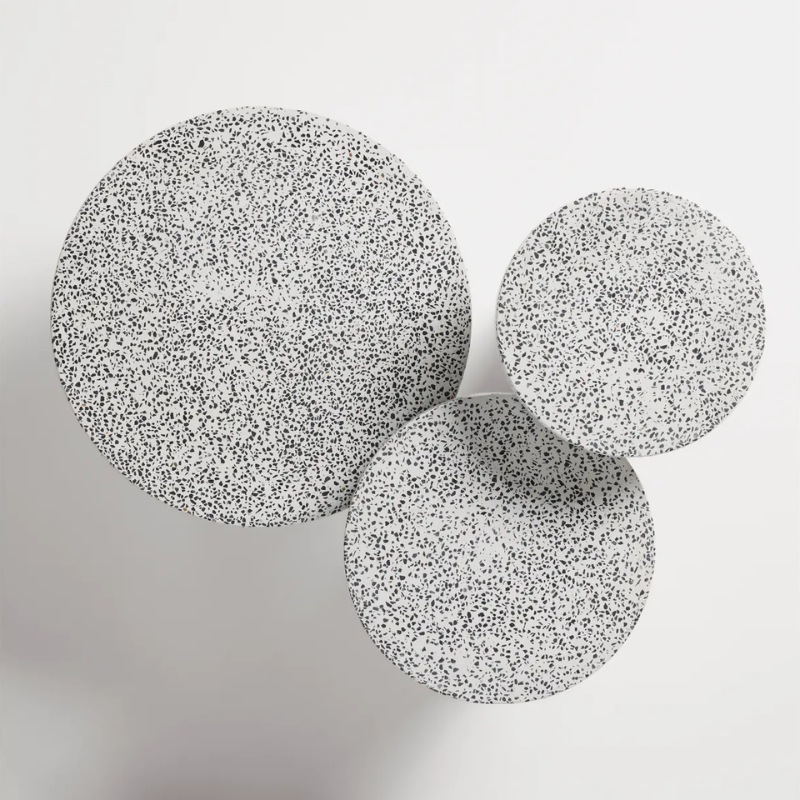 The Hunky Dory Side Table from Blu Dot in white terrazzo with the Hunky Dory Coffee Table and Tall Side Table from the top.