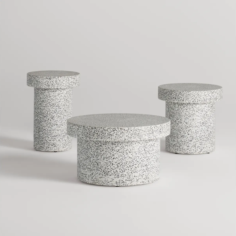 The Hunky Dory Tall Side Table from Blu Dot in white terrazzo with the Hunky Dory Side Table and Coffee Table options.