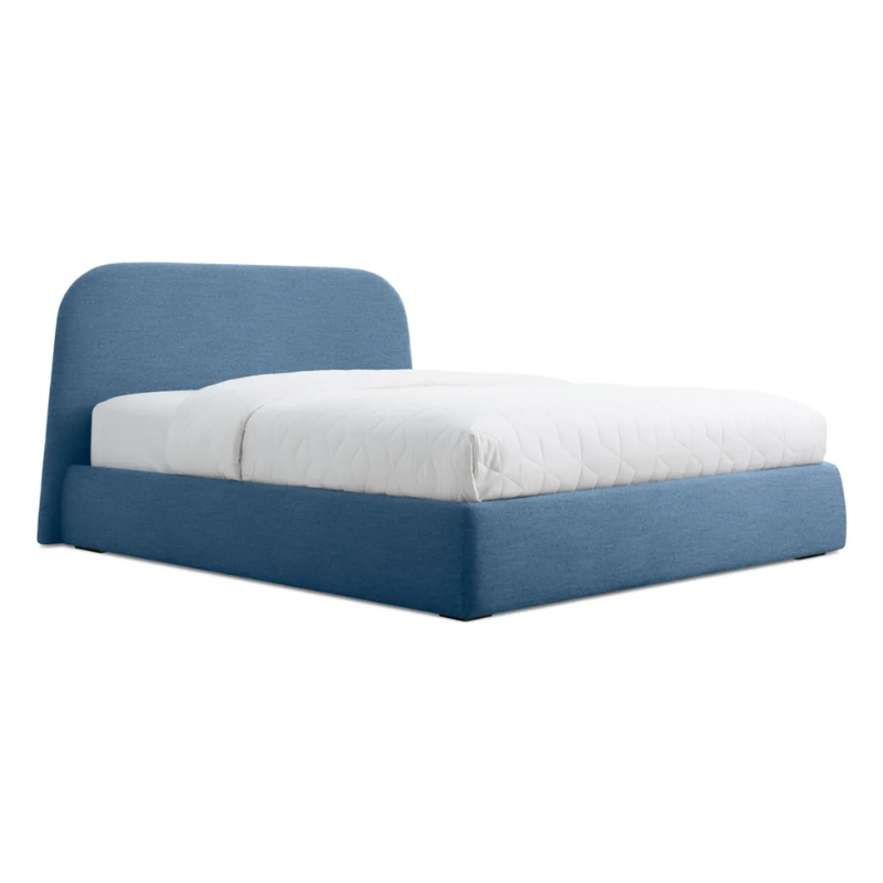 The queen size Lid Bed from Blu Dot in vesper marine blue upholstery.
