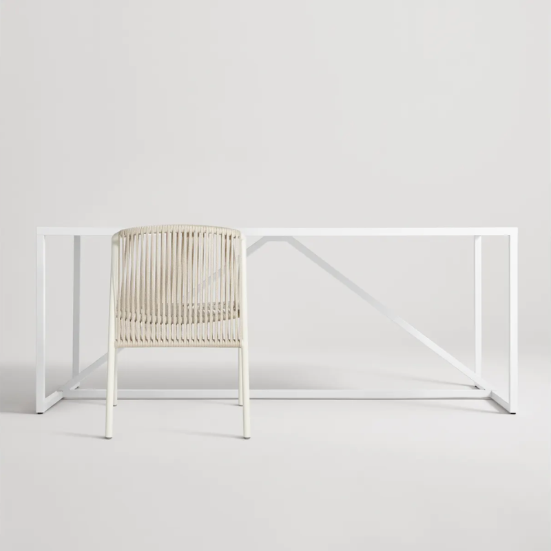 The Lookout Outdoor Chair from Blu Dot in a dining room.