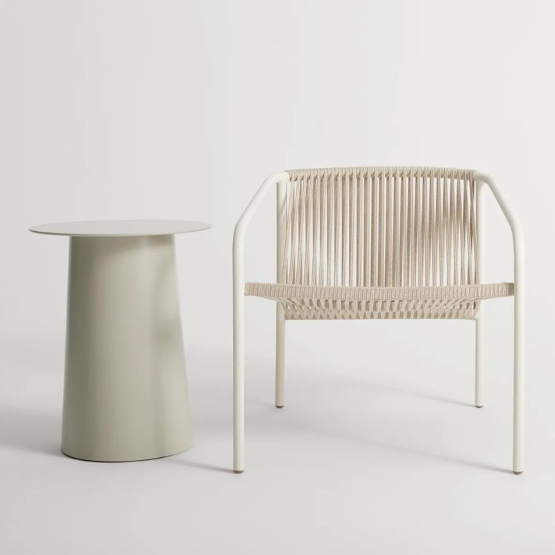 The Lookout Outdoor Lounge Chair from Blu Dot in a studio.