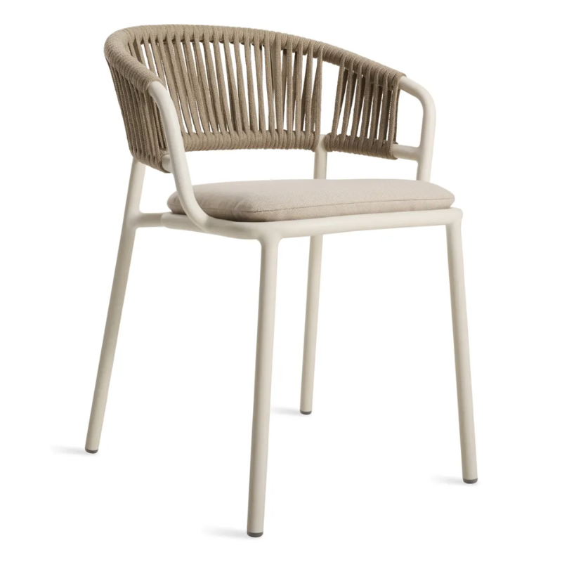 The Mate Outdoor Chair from Blu Dot with Sunbrella Linen upholstery from an angle.