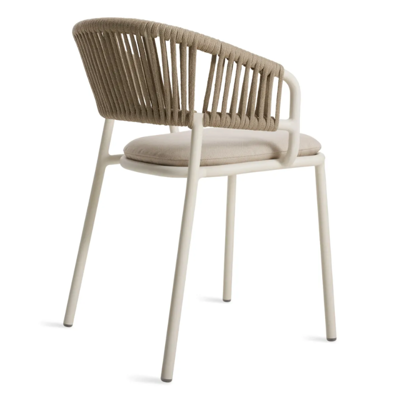 The Mate Outdoor Chair from Blu Dot with Sunbrella Linen upholstery from the back at an angle.