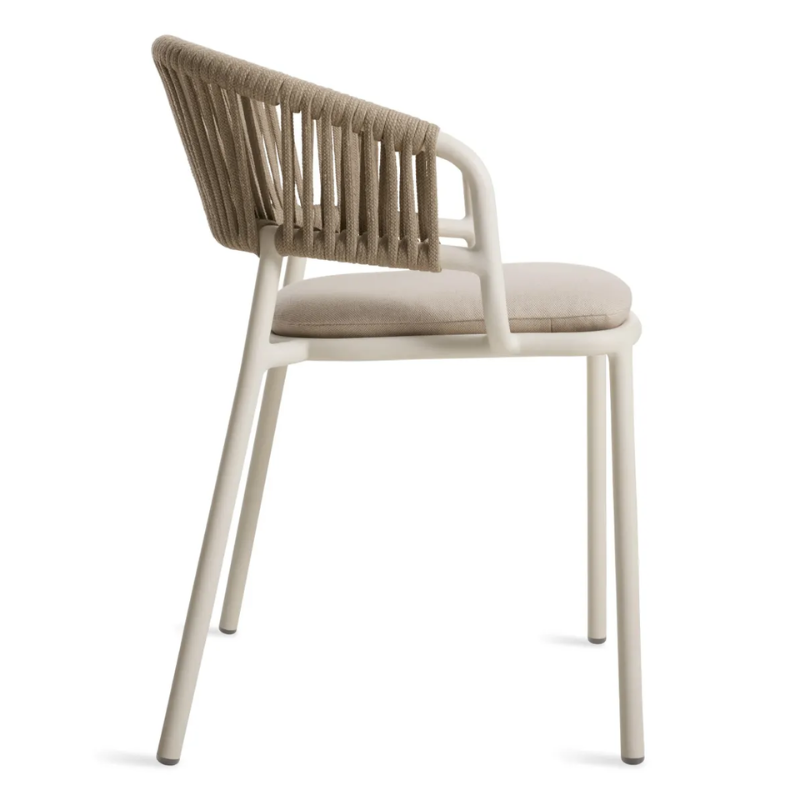 The Mate Outdoor Chair from Blu Dot with Sunbrella Linen upholstery from the side.