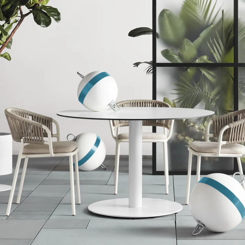 The Mate Outdoor Chair from Blu Dot in a living room.