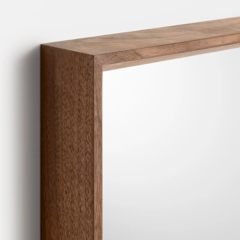 The Mode Large Mirror from Blu Dot in walnut close up.