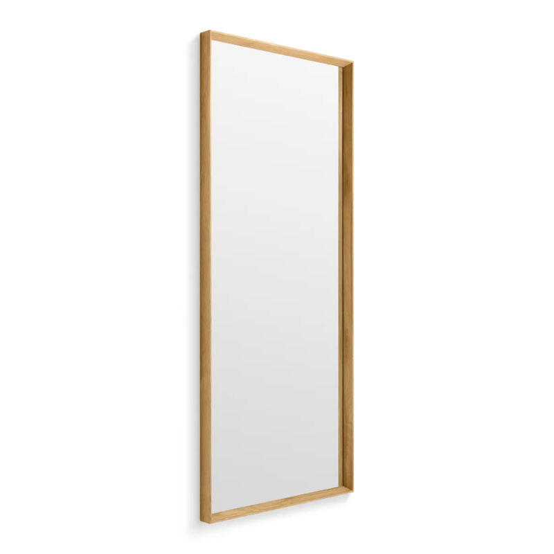 The Mode Large Mirror from Blu Dot in white oak from the side.