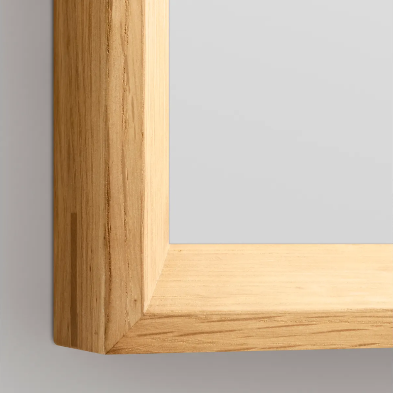 The Mode Small Mirror from Blu Dot in white oak close up.