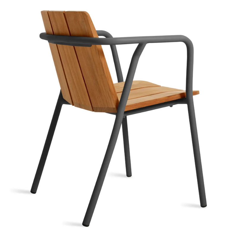The Offline Outdoor Chair from Blu Dot in carbon from the back at an angle.