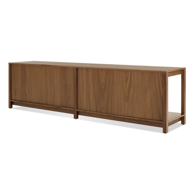 The Open Plan Bench from Blu Dot in walnut from the back at an angle.