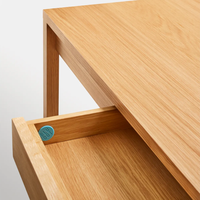 The large Open Plan Desk from Blu Dot in white oak close up.