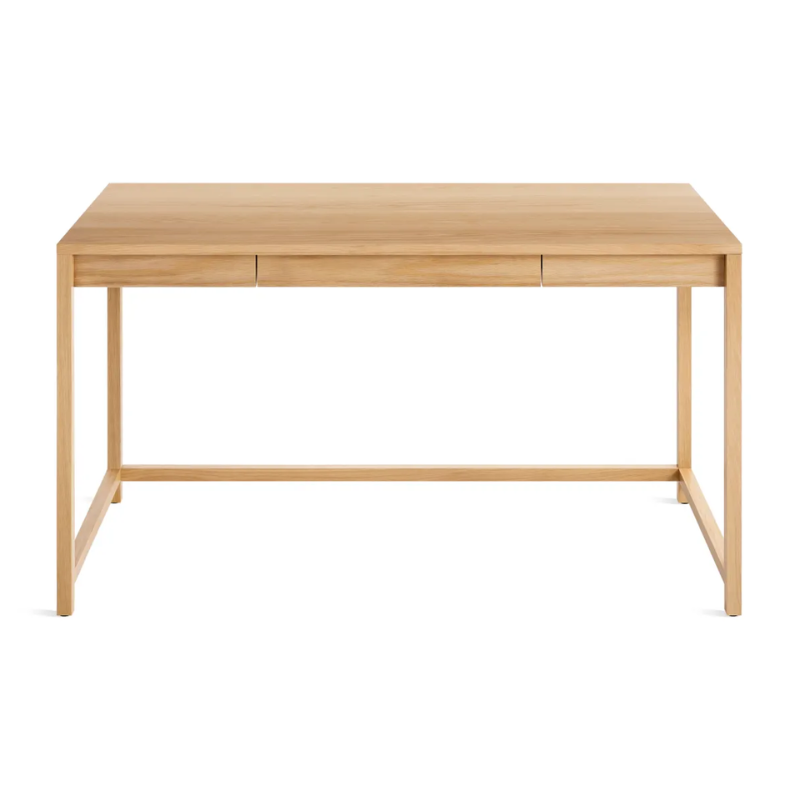 The large Open Plan Desk from Blu Dot in white oak from a high angle.
