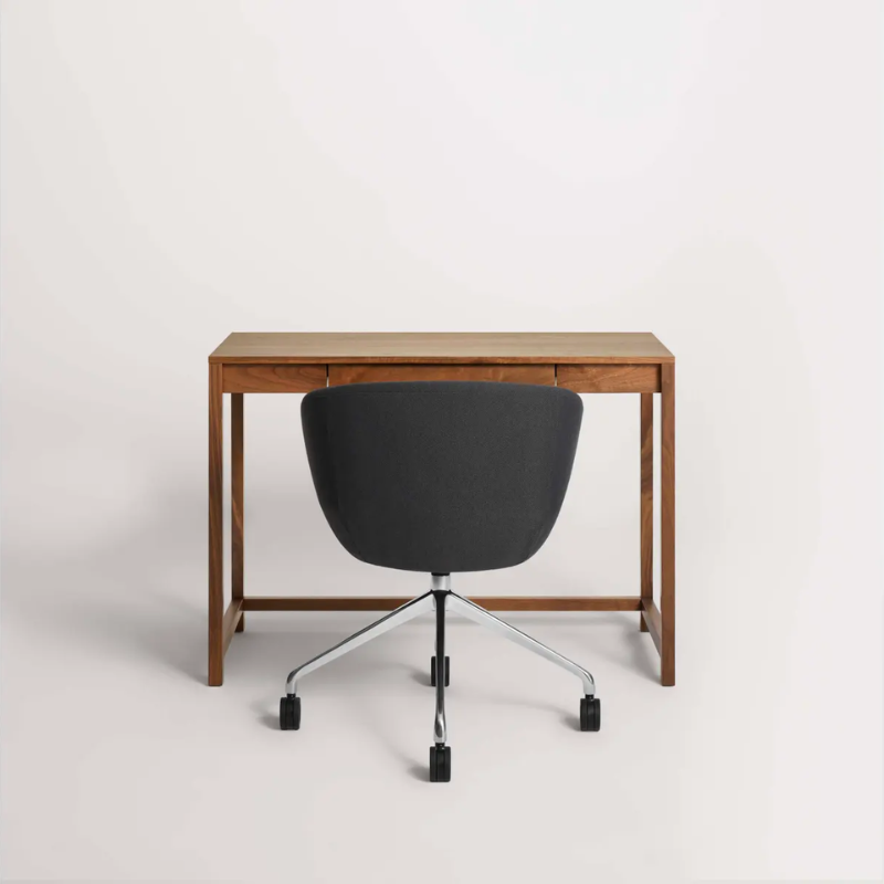 The small Open Plan Desk from Blu Dot in a studio.