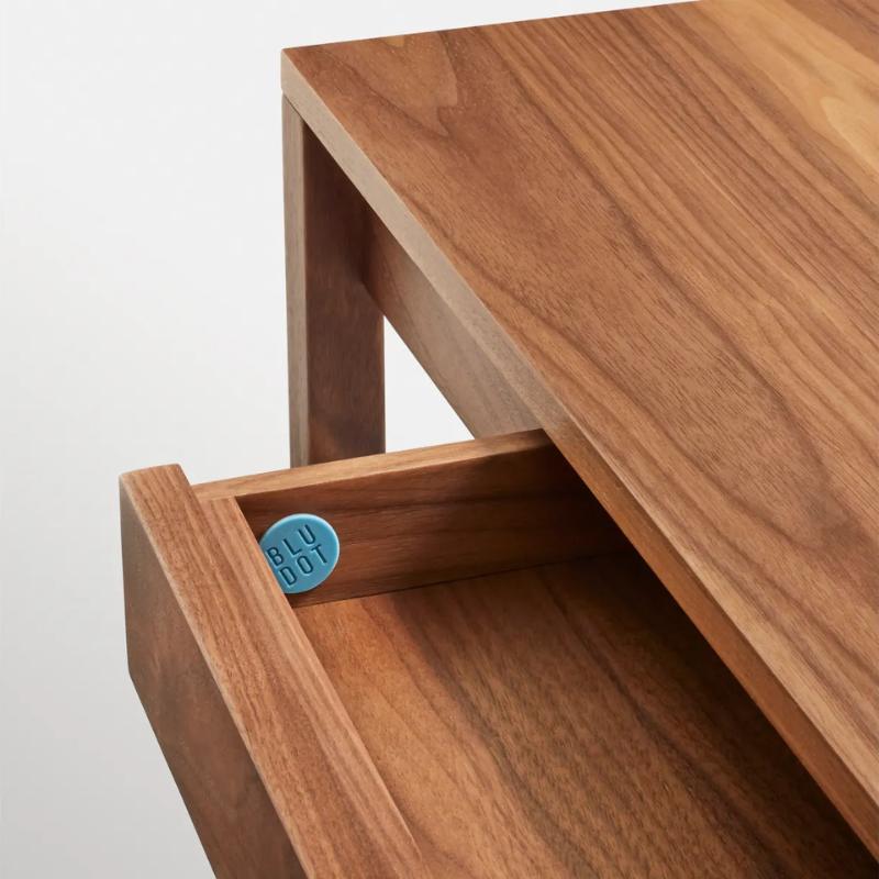 The small Open Plan Desk from Blu Dot in walnut close up.