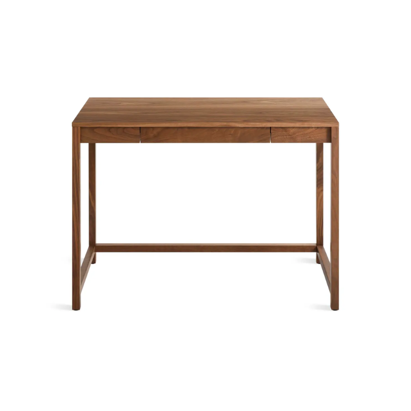 The small Open Plan Desk from Blu Dot in walnut from a high angle.