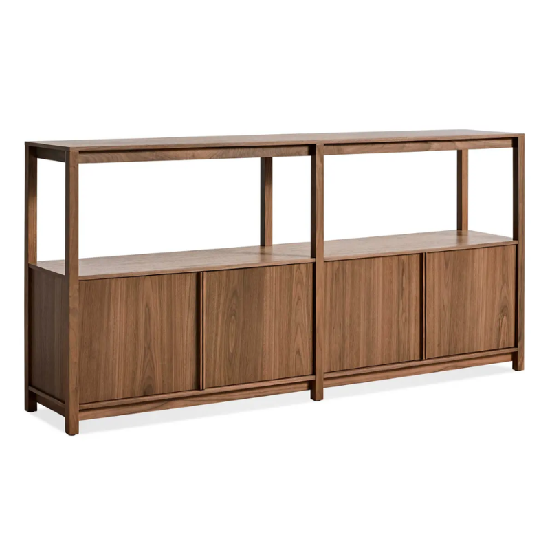 The Open Plan Large Low Bookcase with Storage from Blu Dot in walnut from an angle.