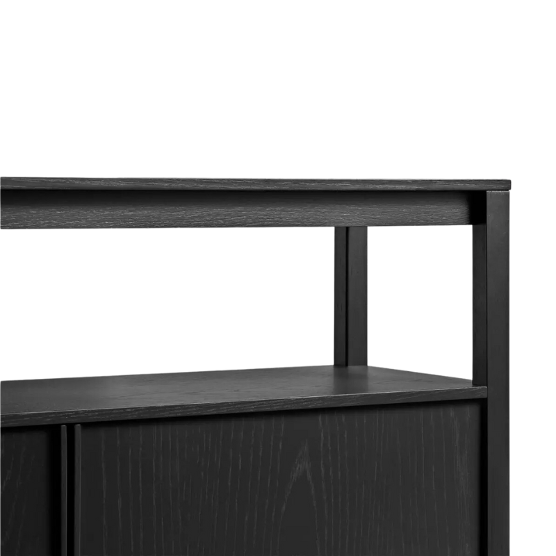 The Open Plan Long and Low Bookcase with Storage from Blu Dot in black on ash in a close up.