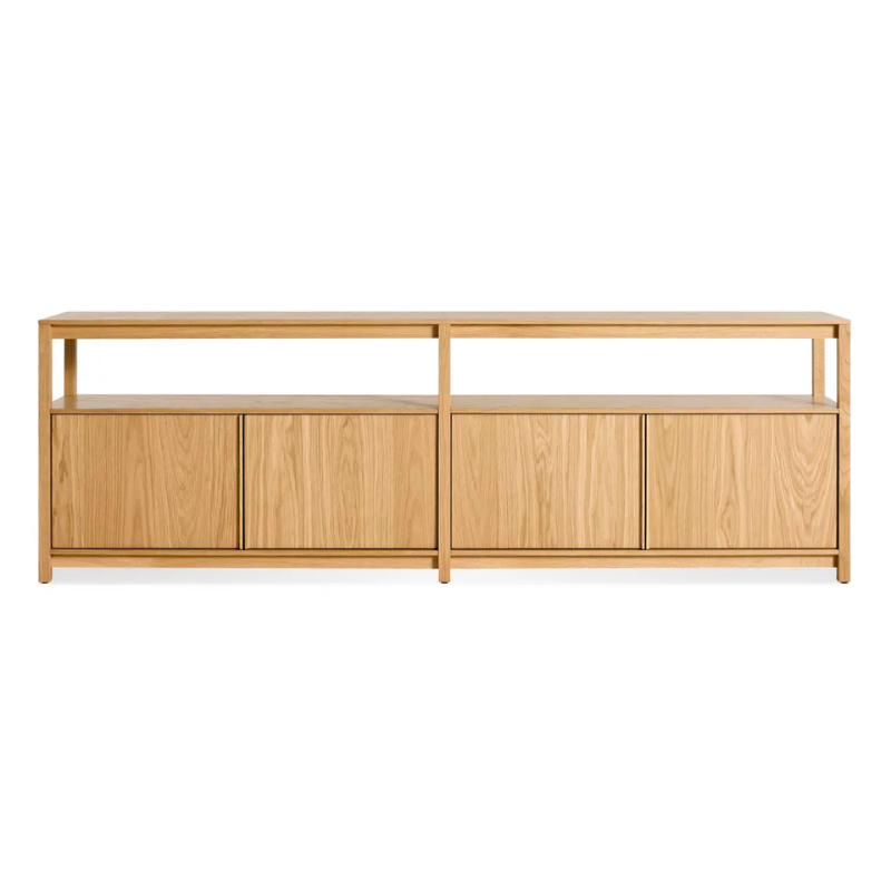 The Open Plan Long and Low Bookcase with Storage from Blu Dot in white oak.