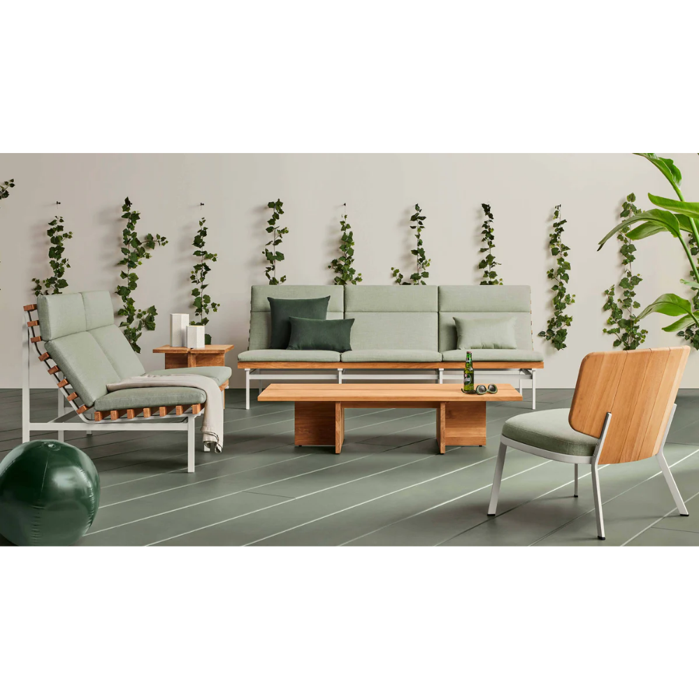 The sunbrella oasis Perch Outdoor 3 and 2 Seat Sofa with white frame from Bludot in lounge area. all-groups