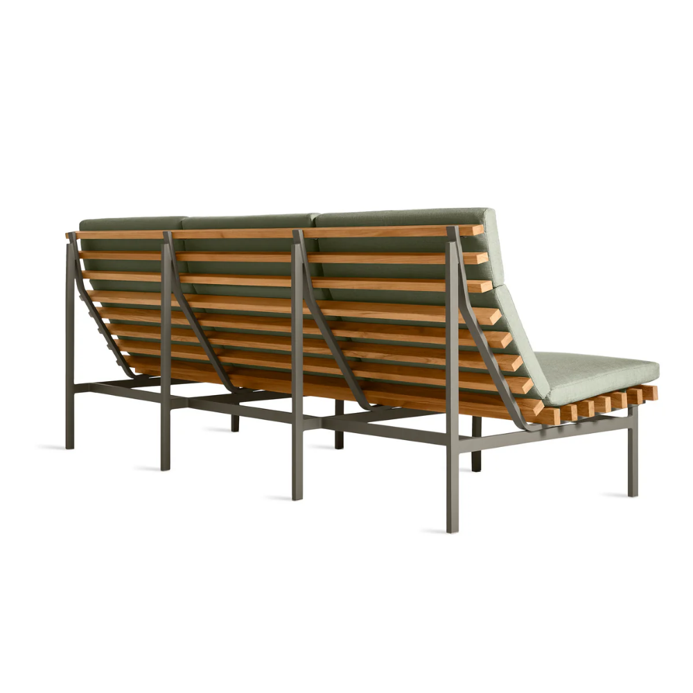 The sunbrella oasis Perch Outdoor 3 Seat Sofa with charcoal frame by Bludot from the rear side.