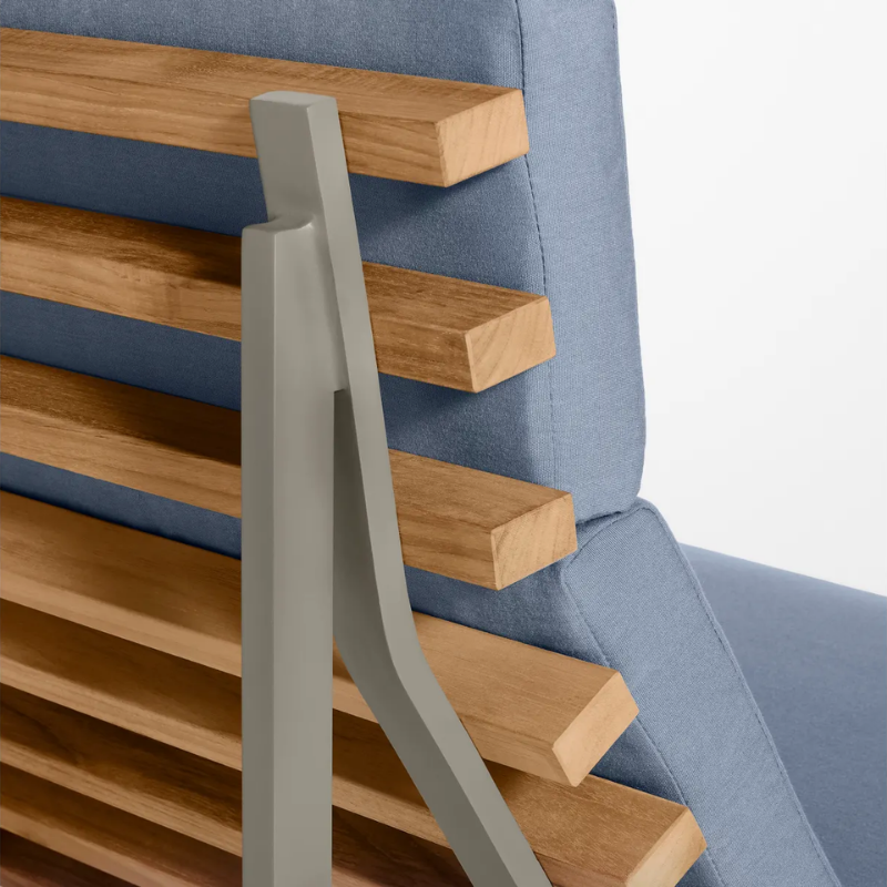 The Perch Outdoor 2 Seat Sofa from Blu Dot with charcoal frame and sunbrella haze upholstery close up.