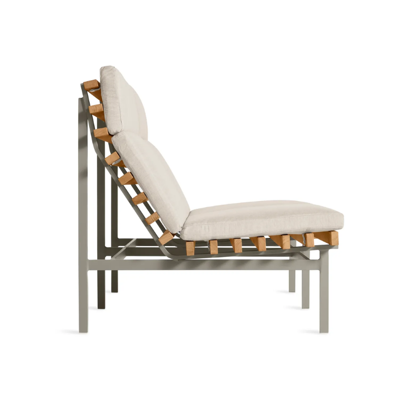 The Perch Outdoor 2 Seat Sofa from Blu Dot with charcoal frame and sunbrella linen upholstery from the side.