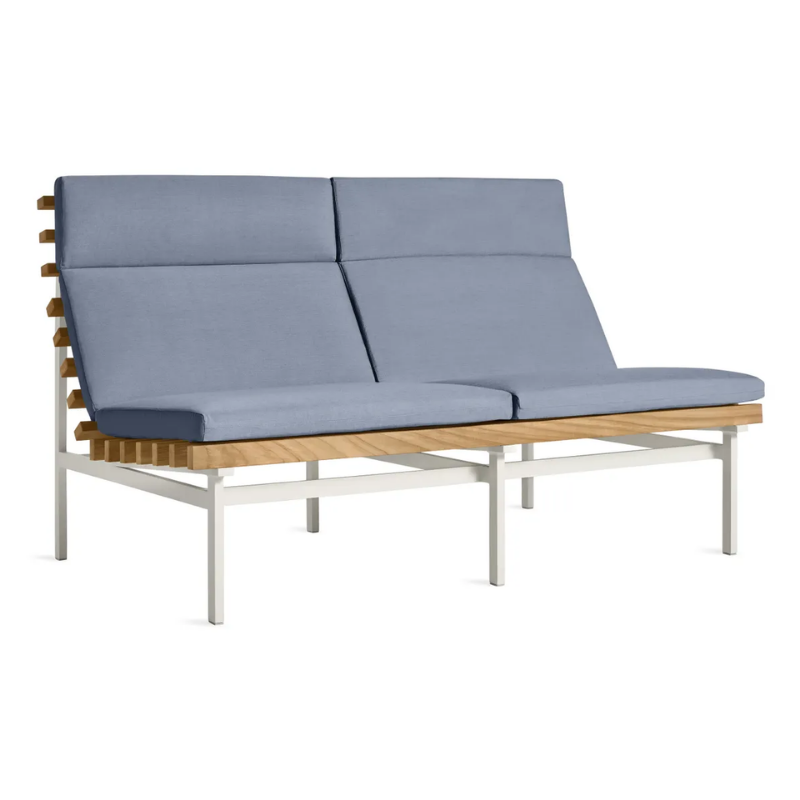 The Perch Outdoor 2 Seat Sofa from Blu Dot with white frame and sunbrella haze upholstery from an angle.
