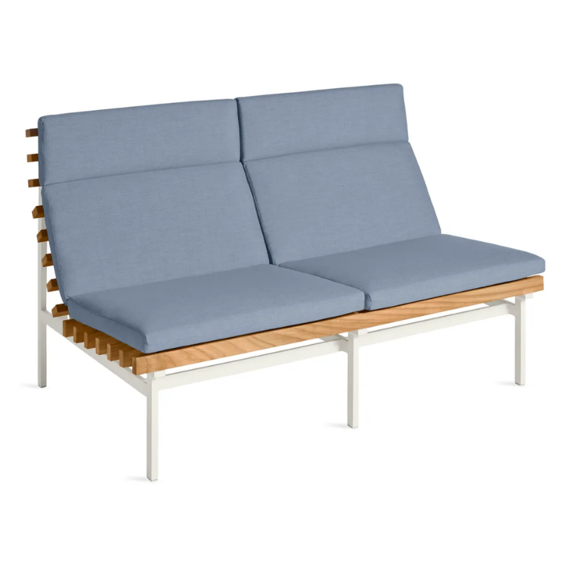 The Perch Outdoor 2 Seat Sofa from Blu Dot with white frame and sunbrella haze upholstery from a high angle.