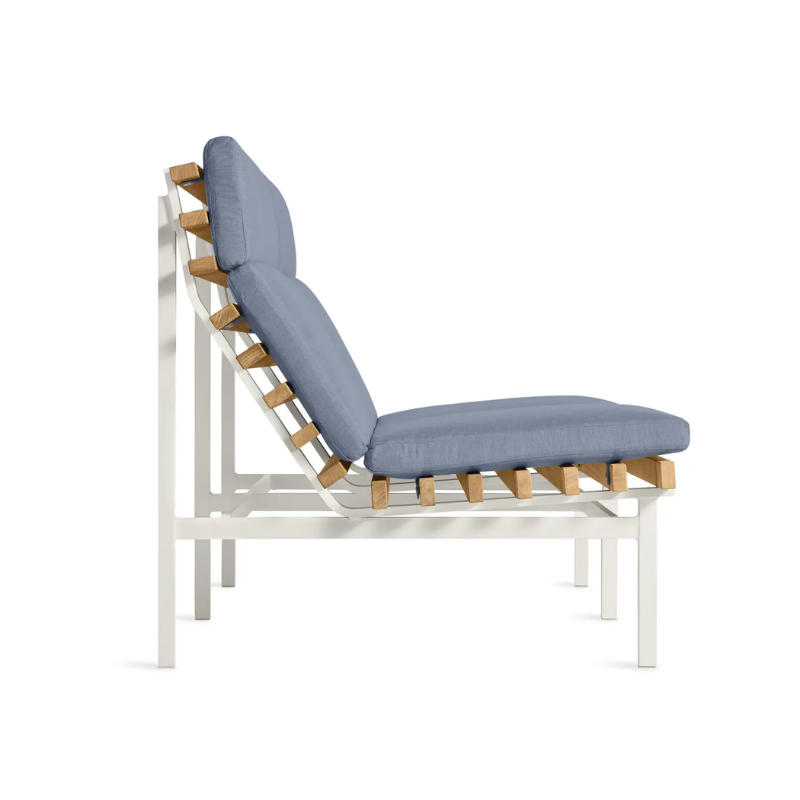 The Perch Outdoor 2 Seat Sofa from Blu Dot with white frame and sunbrella haze upholstery from the side.