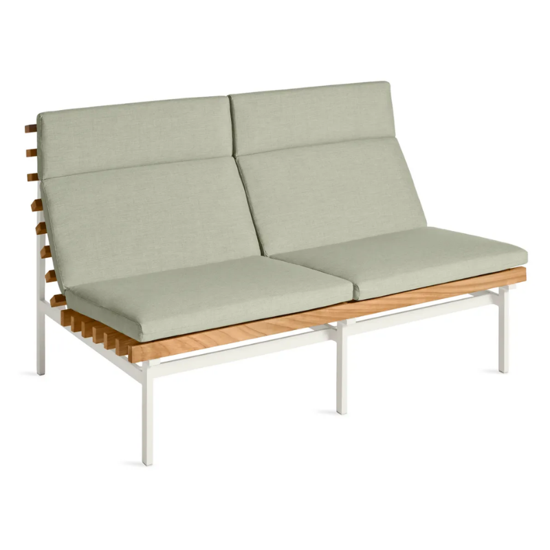 The Perch Outdoor 2 Seat Sofa from Blu Dot with white frame and sunbrella oasis upholstery from a high angle.