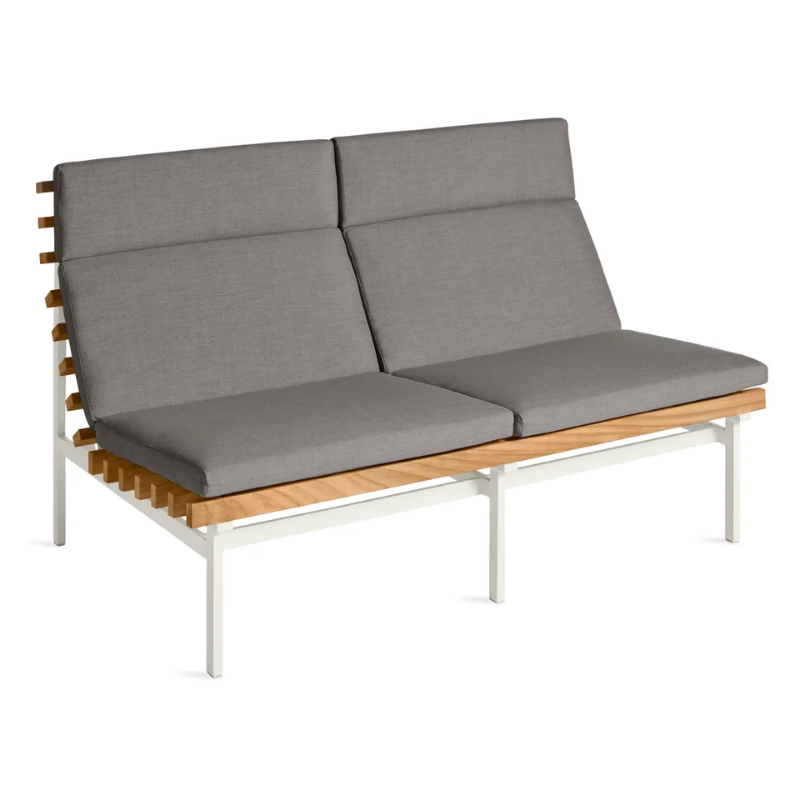 The Perch Outdoor 2 Seat Sofa from Blu Dot with white frame and toohey charcoal upholstery from a high angle.