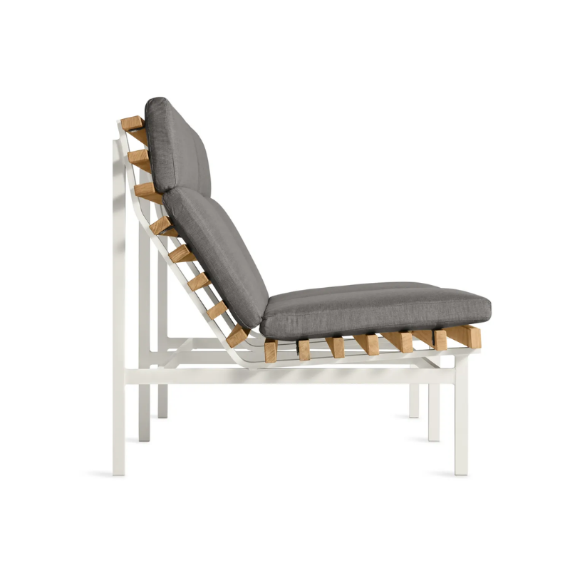 The Perch Outdoor 2 Seat Sofa from Blu Dot with white frame and toohey charcoal upholstery from the side.