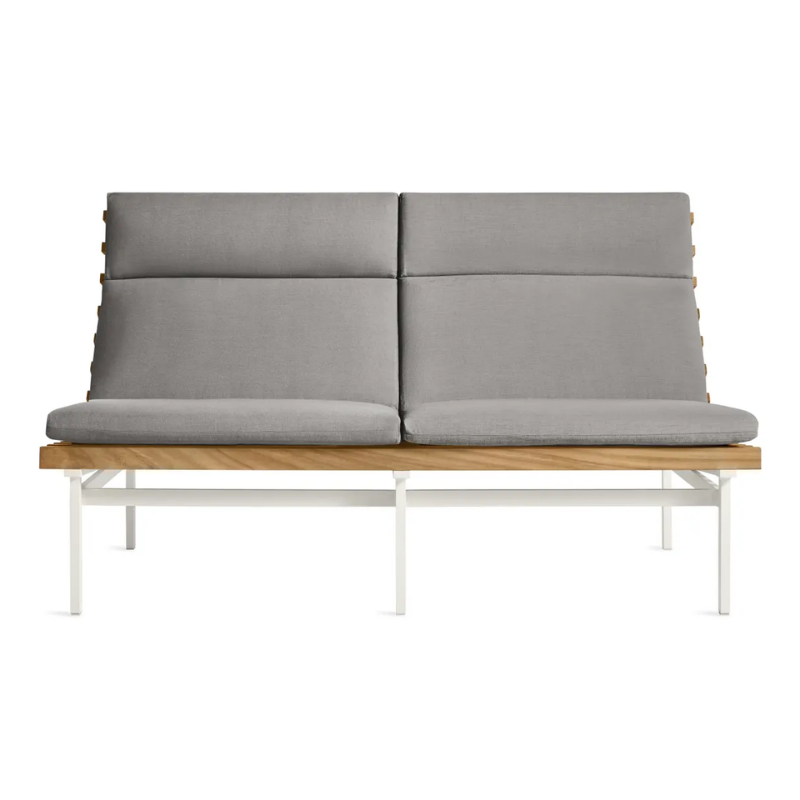 The Perch Outdoor 2 Seat Sofa from Blu Dot with white frame and toohey charcoal upholstery.