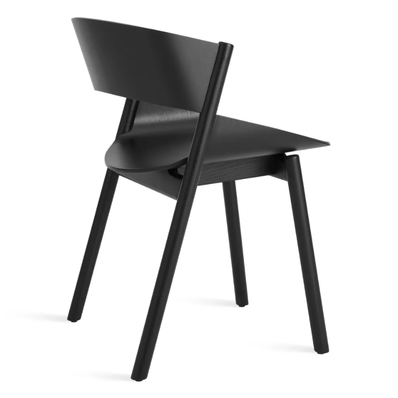 The Port Chair from Blu Dot in black on ash from a back angle.