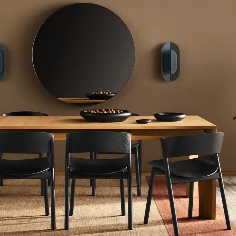 The Port Chair from Blu Dot in a dining room.