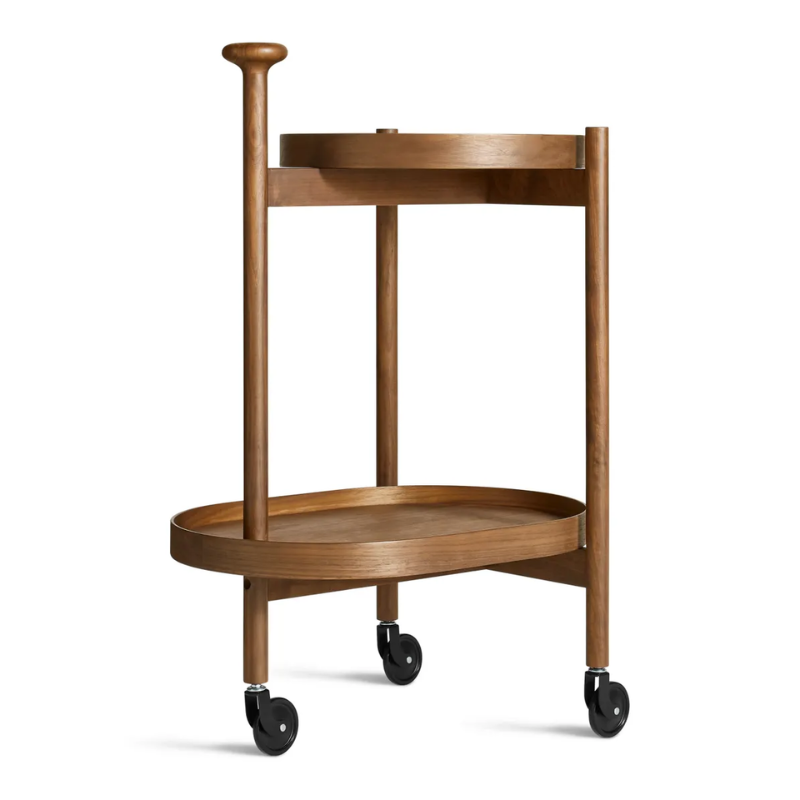 The Pose Bar Cart from Blu Dot in walnut from an angle.