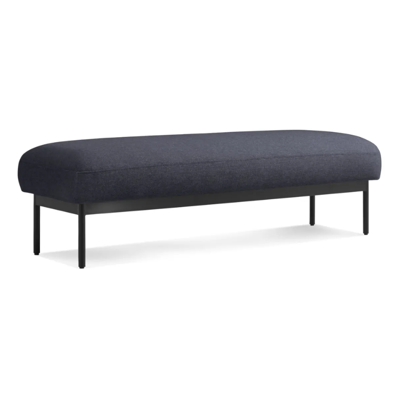 The Puff Puff Bench from Blu Dot with edwards navy fabric upholstery from an angle.